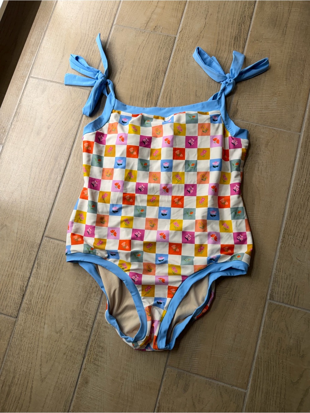 Woman’s Multicolor Checkered One-Piece Swimsuit with Blue Ties